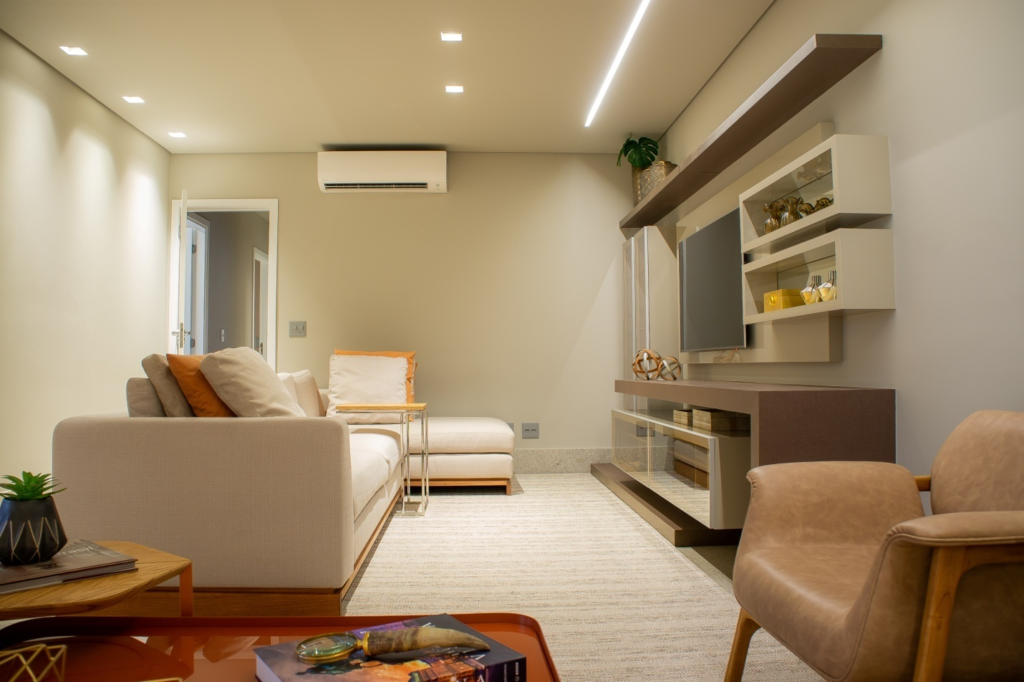 A spacious living room with a working air conditioner