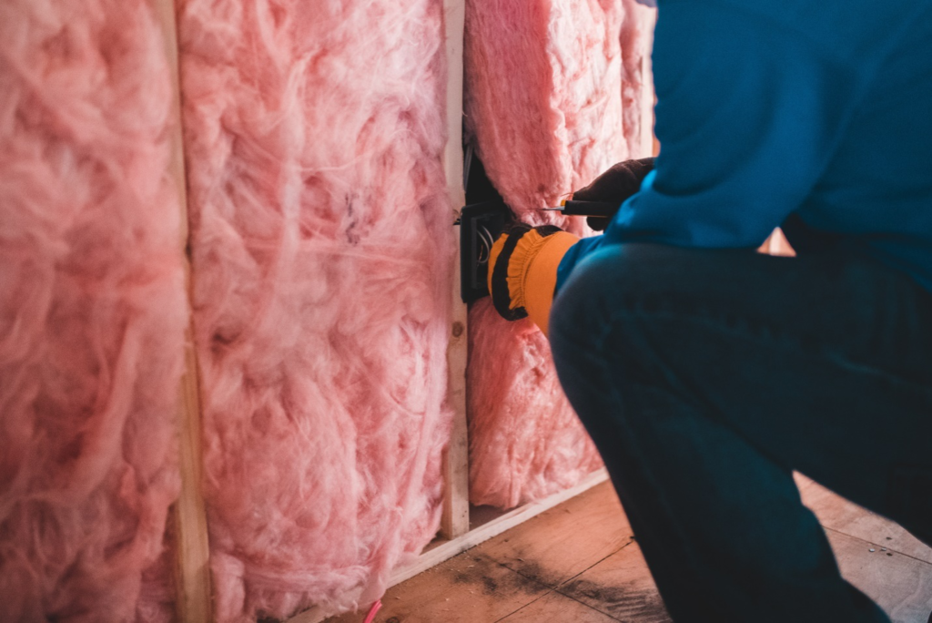 A man fixing insulating material