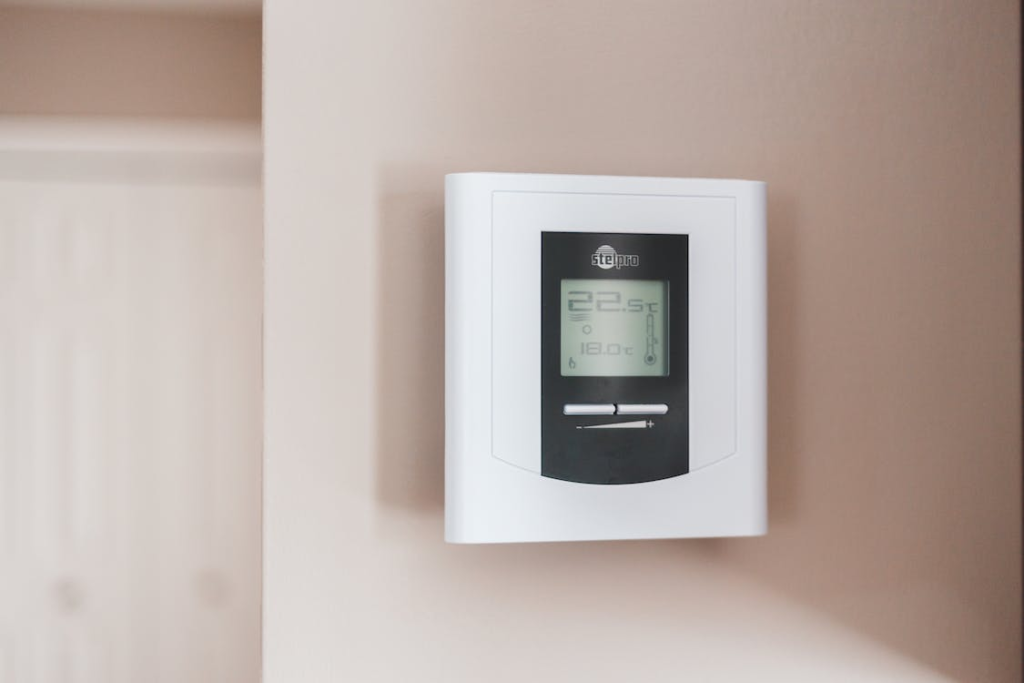 Wi-Fi thermostat installed on a wall